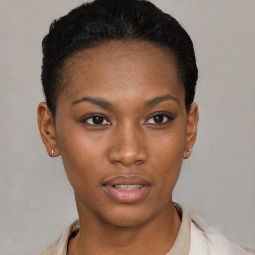 Neutral black young-adult female with short  black hair and brown eyes