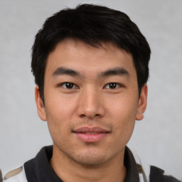 Neutral asian young-adult male with short  brown hair and brown eyes