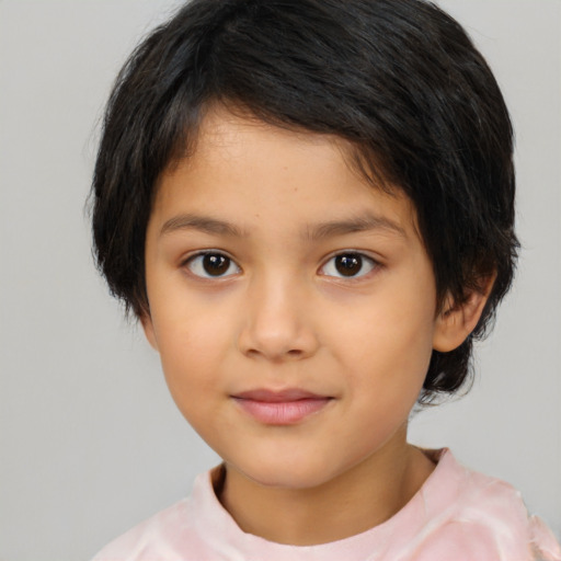 Joyful latino child female with medium  brown hair and brown eyes