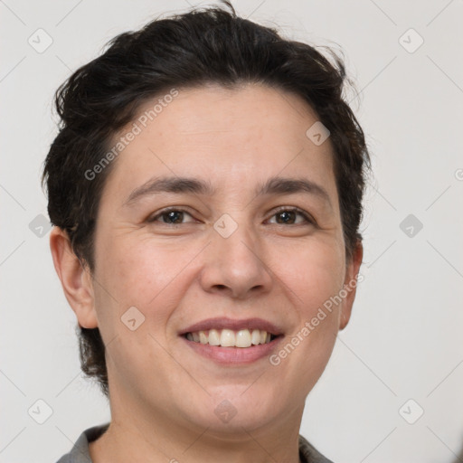 Joyful white adult female with short  brown hair and brown eyes