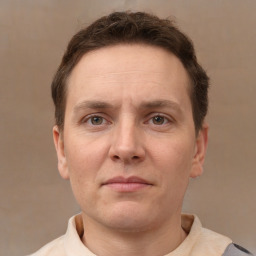 Neutral white adult male with short  brown hair and brown eyes