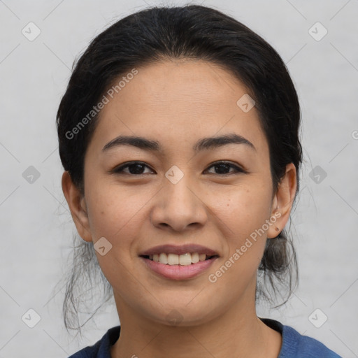 Joyful latino young-adult female with medium  black hair and brown eyes