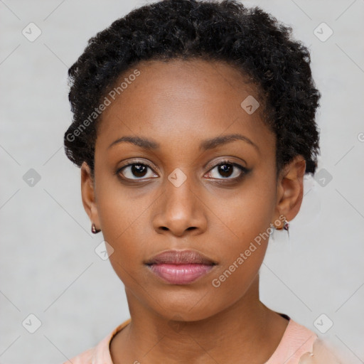 Neutral black young-adult female with short  black hair and brown eyes