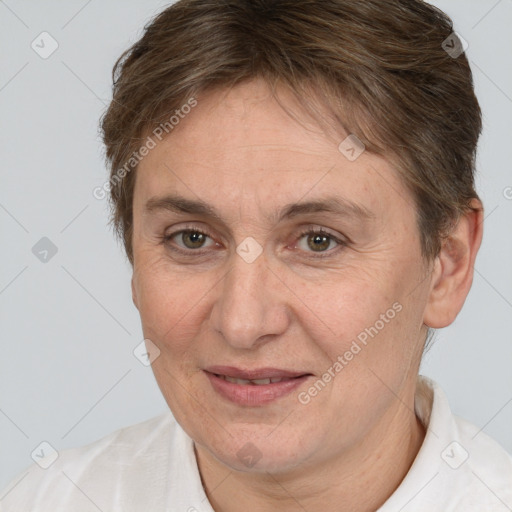 Joyful white adult female with short  brown hair and brown eyes