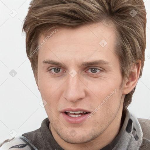 Joyful white adult male with short  brown hair and grey eyes