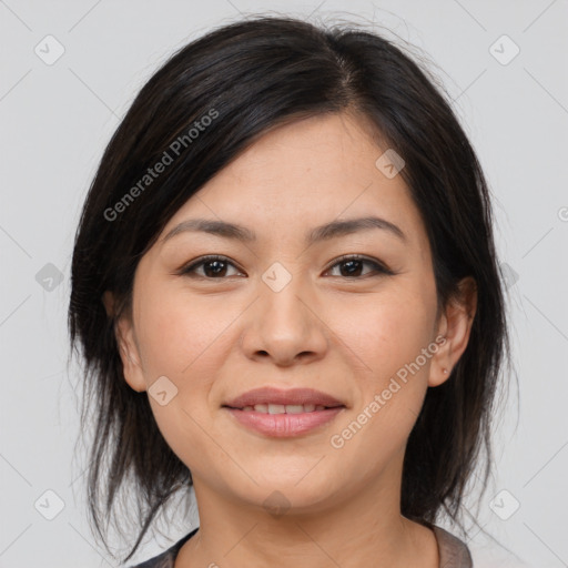 Joyful asian young-adult female with medium  brown hair and brown eyes