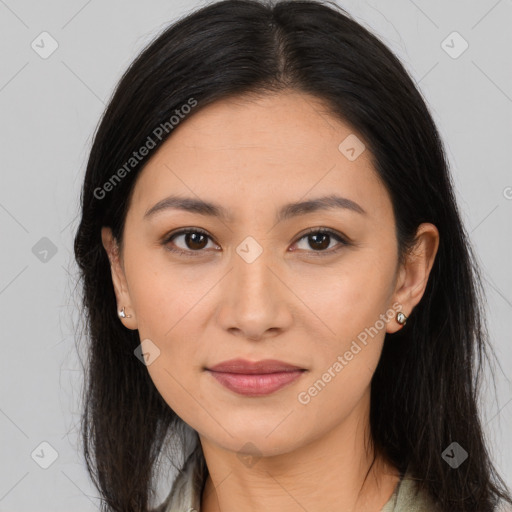 Joyful latino young-adult female with long  brown hair and brown eyes