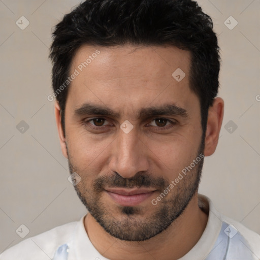 Joyful white young-adult male with short  black hair and brown eyes