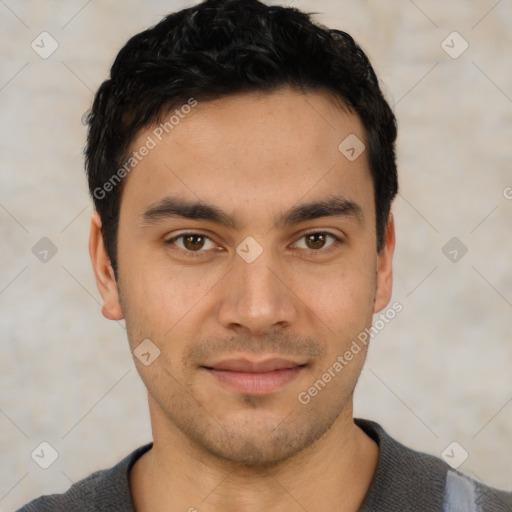 Joyful latino young-adult male with short  black hair and brown eyes