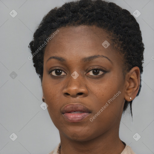 Neutral black young-adult female with short  brown hair and brown eyes