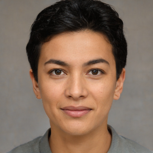 Joyful white young-adult female with short  brown hair and brown eyes