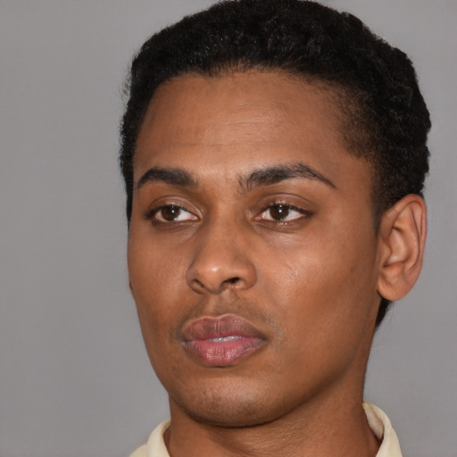 Neutral black young-adult male with short  black hair and brown eyes
