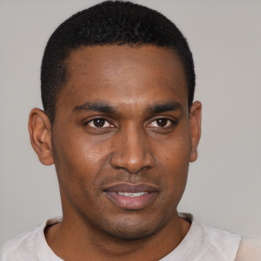 Neutral black young-adult male with short  black hair and brown eyes
