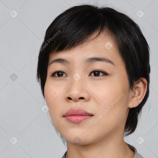 Neutral asian young-adult female with medium  black hair and brown eyes