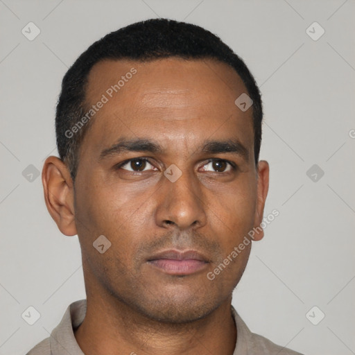 Neutral latino young-adult male with short  black hair and brown eyes