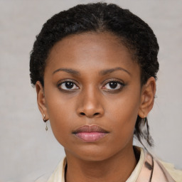 Neutral black young-adult female with short  brown hair and brown eyes