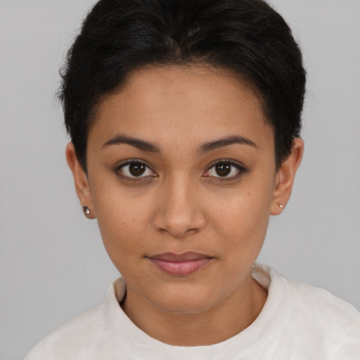 Joyful latino young-adult female with short  brown hair and brown eyes