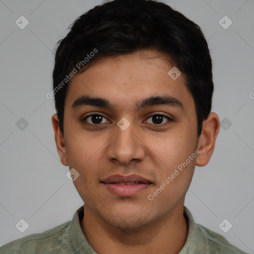 Joyful latino young-adult male with short  black hair and brown eyes