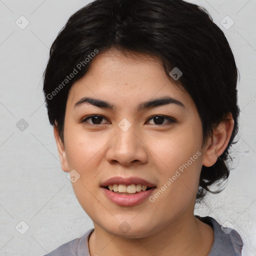 Joyful asian young-adult female with medium  black hair and brown eyes