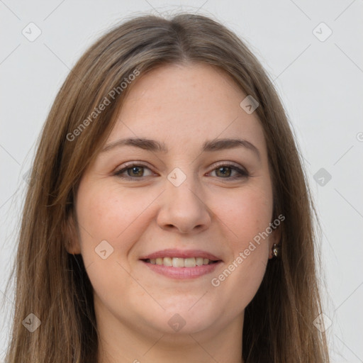 Joyful white young-adult female with long  brown hair and grey eyes