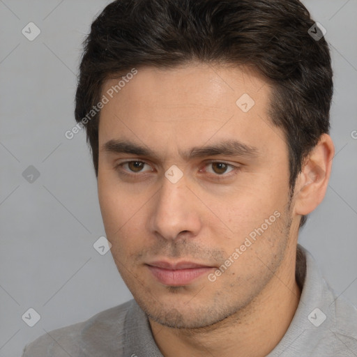 Neutral white young-adult male with short  brown hair and brown eyes