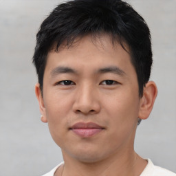 Neutral asian young-adult male with short  black hair and brown eyes