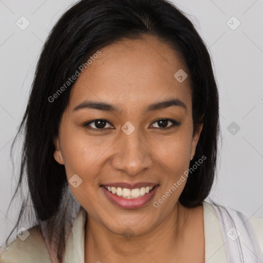 Joyful black young-adult female with medium  brown hair and brown eyes