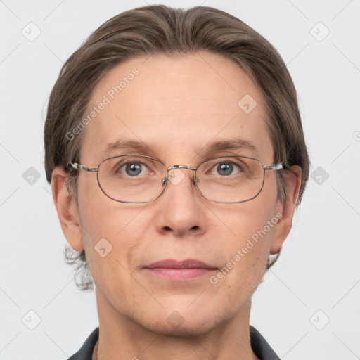 Joyful white adult male with short  brown hair and grey eyes