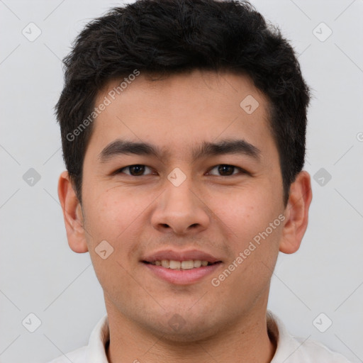 Joyful latino young-adult male with short  brown hair and brown eyes