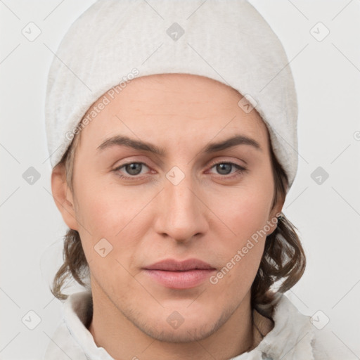 Joyful white young-adult female with medium  brown hair and grey eyes