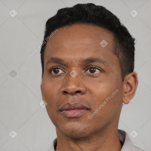 Neutral black adult male with short  black hair and brown eyes