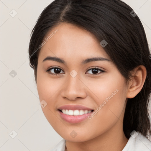 Joyful latino young-adult female with medium  brown hair and brown eyes