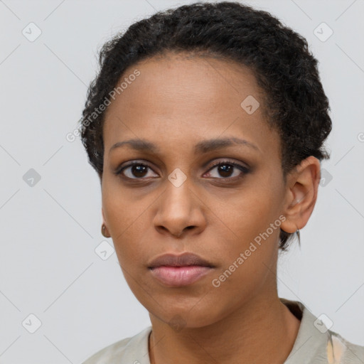 Neutral black young-adult female with short  black hair and brown eyes