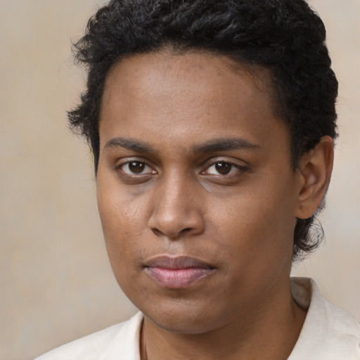 Neutral black young-adult male with short  brown hair and brown eyes