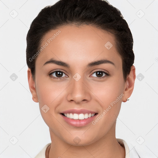 Joyful white young-adult female with short  brown hair and brown eyes