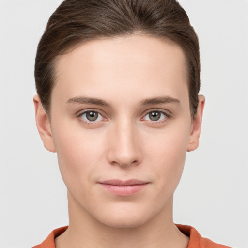 Neutral white young-adult female with short  brown hair and brown eyes