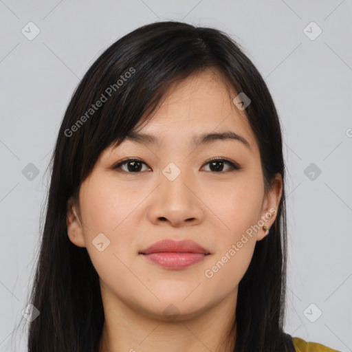 Joyful asian young-adult female with long  brown hair and brown eyes