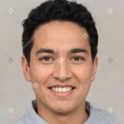 Joyful white young-adult male with short  black hair and brown eyes