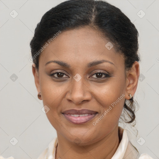 Joyful latino young-adult female with short  brown hair and brown eyes