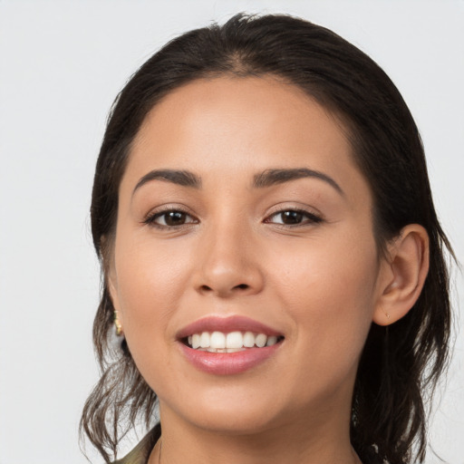 Joyful white young-adult female with medium  brown hair and brown eyes