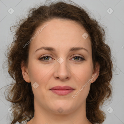 Joyful white young-adult female with medium  brown hair and green eyes