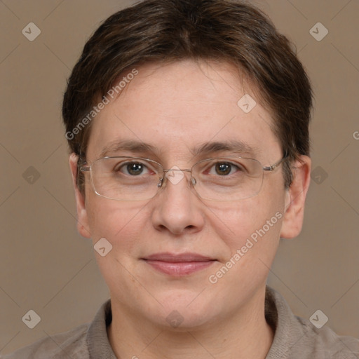 Joyful white adult female with short  brown hair and grey eyes