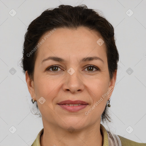 Joyful white adult female with short  brown hair and grey eyes