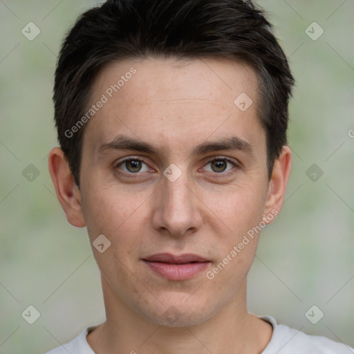 Joyful white young-adult male with short  brown hair and brown eyes