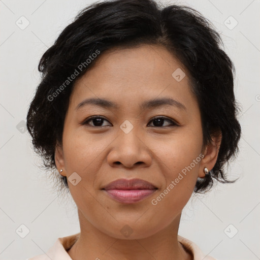 Joyful asian adult female with medium  brown hair and brown eyes