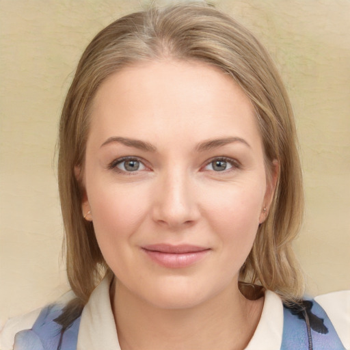 Joyful white young-adult female with medium  brown hair and blue eyes