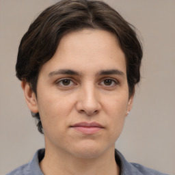 Joyful white young-adult male with medium  brown hair and brown eyes