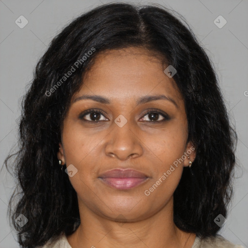 Joyful black young-adult female with medium  brown hair and brown eyes