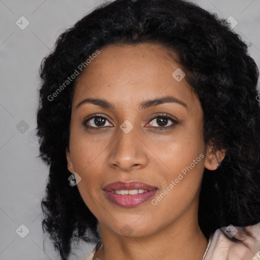 Joyful latino young-adult female with long  black hair and brown eyes