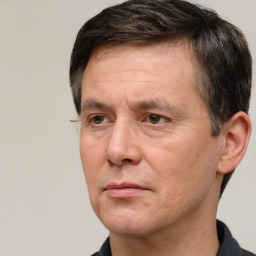 Neutral white adult male with short  brown hair and brown eyes